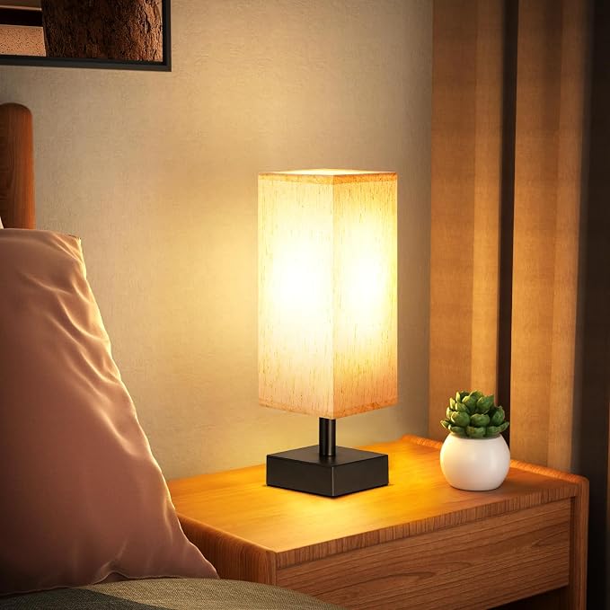 Minimalist Bedside Table Lamp with Cream Fabric Shade and Black Base